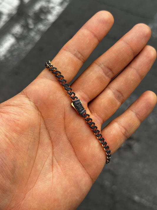 Pulso negro + dorado — 20 cm / 10.7